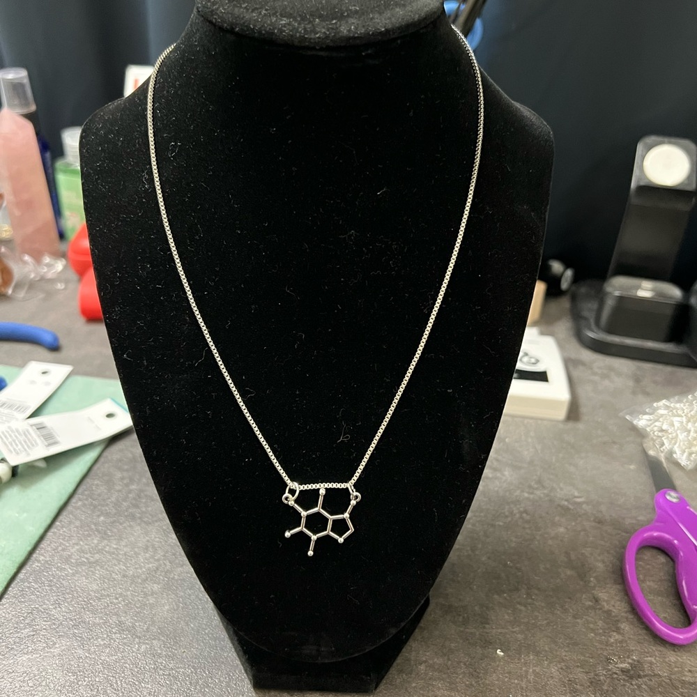 Caffeine molecule necklace